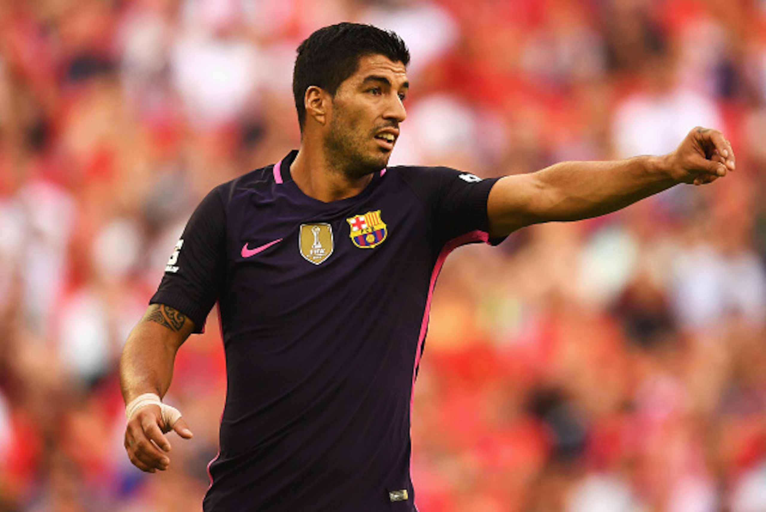 LONDON, ENGLAND - AUGUST 06: Luis Suarez of Barcelona looks on during the International Champions Cup match between Liverpool and Barcelona at Wembley Stadium on August 6, 2016 in London, England.  (Photo by Mike Hewitt/Getty Images)