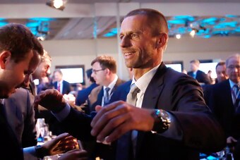ATHENS, GREECE - SEPTEMBER14: Newly elected UEFA President Aleksander Ceferin is congratulated at the 12th Extraordinary UEFA congress in  in Athens, Greece  14 September 2016.   (Photo by Milos Bicanski/Getty Images)