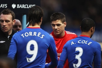 LONDON, ENGLAND - FEBRUARY 06:  Fernando Torres of Chelsea shakes hands with former team mate Steven Gerrard of Liverpool prior to the Barclays Premier League match between Chelsea and Liverpool at Stamford Bridge on February 6, 2011 in London, England.  