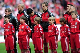 LONDON, ENGLAND - MAY 05:  Liverpool players line up prior to the FA Cup with Budweiser Final match between Liverpool and Chelsea at Wembley Stadium on May 5, 2012 in London, England.  (Photo by Shaun Botterill/Getty Images)