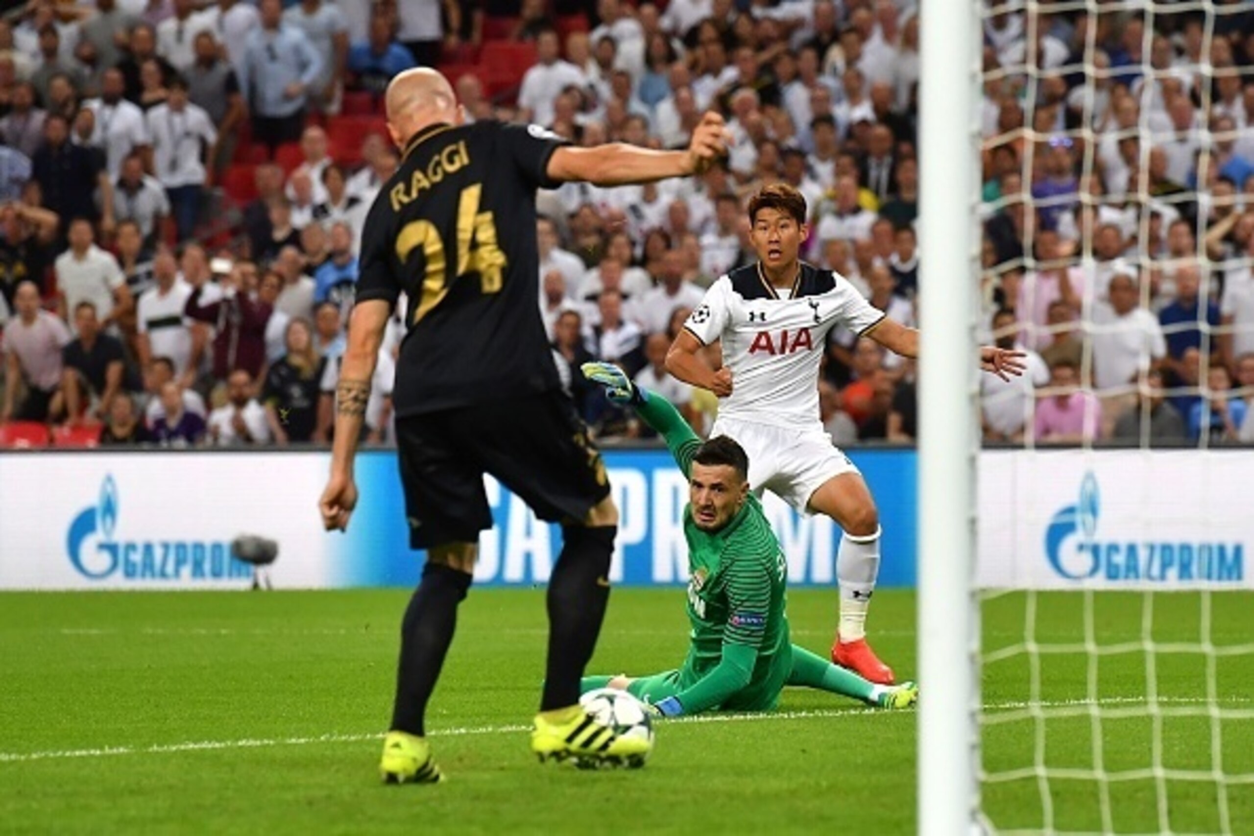 Tottenham Hotspur's South Korean striker Son Heung-Min (R) misses a shot on goal by Monaco's Croatian goalkeeper Danijel Subasic during the UEFA Champions League group E football match between Tottenham Hotspur and Monaco at Wembley Stadium in north Londo