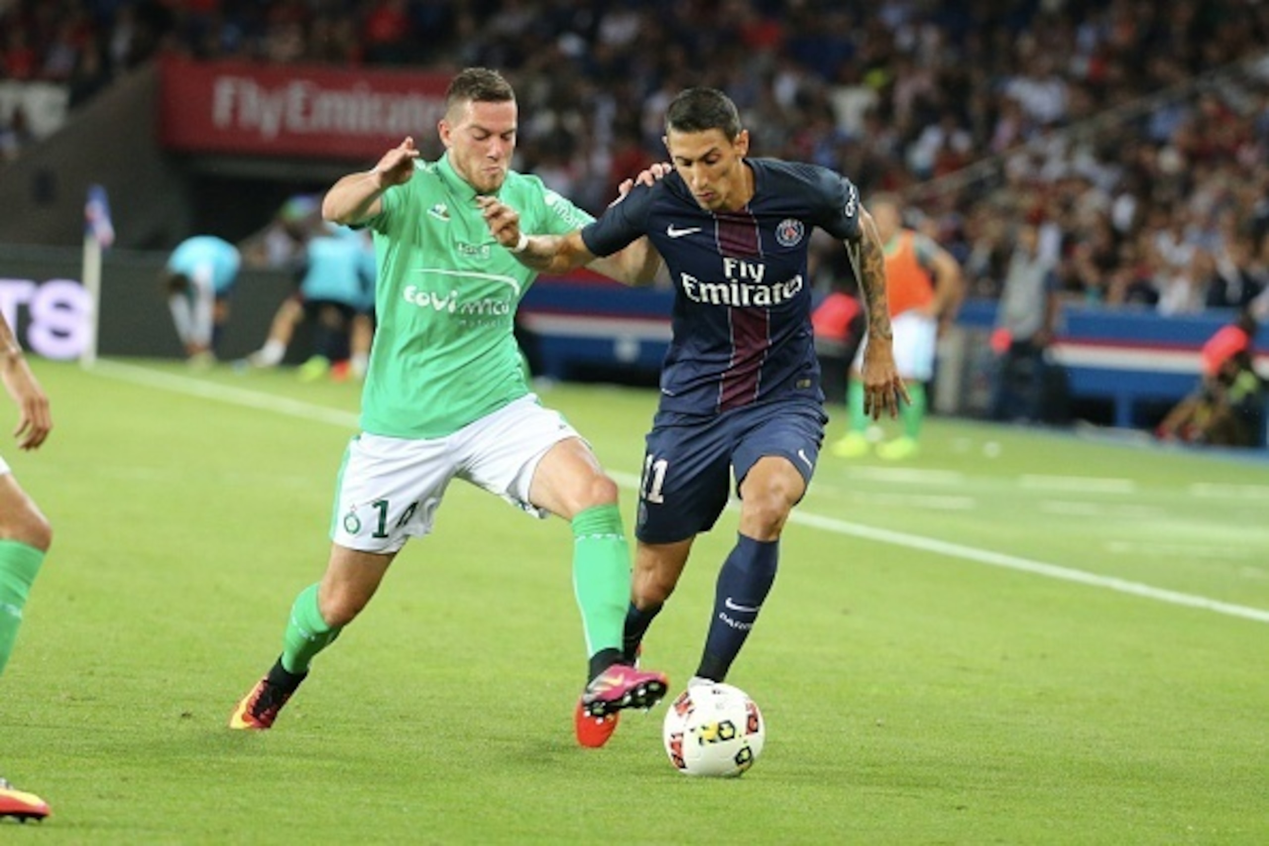 PARIS, FRANCE - SEPTEMBER 09:  Angel Di Maria of Paris Saint-Germain in action with Jordan Veretout of AS Saint-Etienne  during the French Ligue 1 match between Paris Saint-Germain and AS Saint-Etienne at Parc des Princes on September 9, 2016 in Paris, Fr