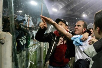 ROME, Italy:  CORRECTION CAPTION - (FILES) Picture dated 06 January 2005  of Lazio's forward Paolo Di Canio gesturing towards Lazio fans at the end of Lazio vs AS Roma Serie A football match at Rome's Olympic stadium. Di Canio isn't to face a disciplinary