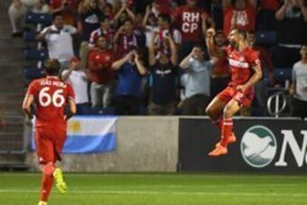 Aug 24, 2016; Chicago, IL, USA; Chicago Fire forward Arturo Alvarez (12) reacts after scoring a goal against the Los Angeles Galaxy during the first half at Toyota Park. Mandatory Credit: Mike DiNovo-USA TODAY Sports
