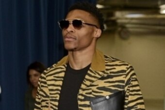 May 28, 2016; Oklahoma City, OK, USA; Oklahoma City Thunder guard Russell Westbrook (0) enters the arena before the game against the Golden State Warriors in game six of the Western conference finals of the NBA Playoffs at Chesapeake Energy Arena. Mandato