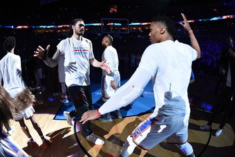 OKLAHOMA CITY, OK - MAY 28:  Russell Westbrook #0 of the Oklahoma City Thunder high fives Steven Adams #12 of the Oklahoma City Thunder before the game against the Golden State Warriors in Game Six of the Western Conference Finals during the 2016 NBA Play