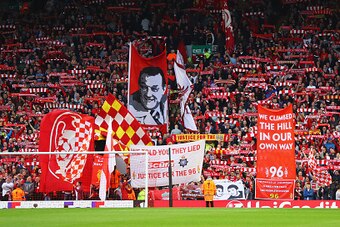 LIVERPOOL, UNITED KINGDOM - MAY 05:  Banners and flags are waved on The Kop prior to the UEFA Europa League semi final second leg match between Liverpool and Villarreal CF at Anfield on May 5, 2016 in Liverpool, England.  (Photo by Richard Heathcote/Getty