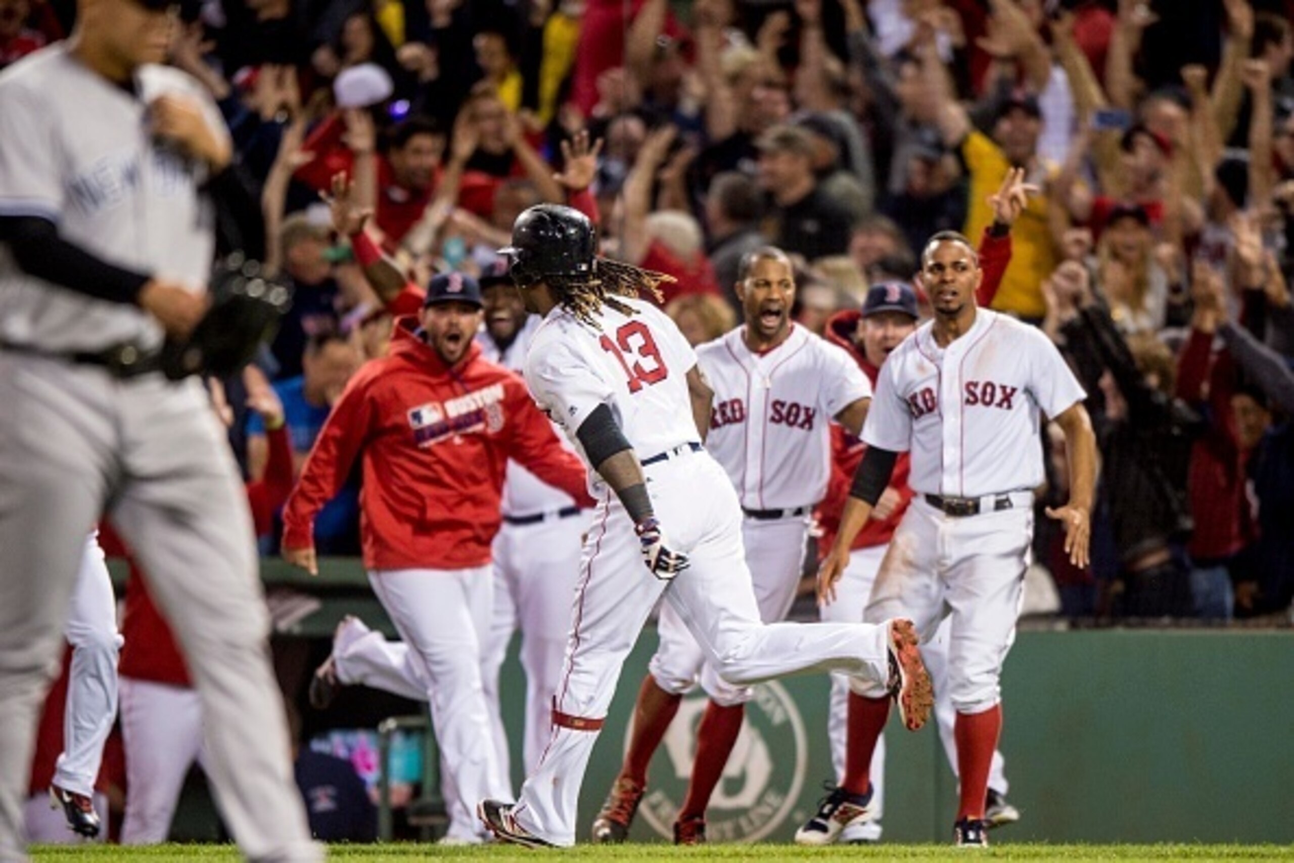 BOSTON, MA - SEPTEMBER 15: Hanley Ramirez #13 of the Boston Red Sox reacts after hitting a walk off three run home run off Dellin Betances #68 of the New York Yankees during the ninth inning of a game on September 15, 2016 at Fenway Park in Boston, Massac