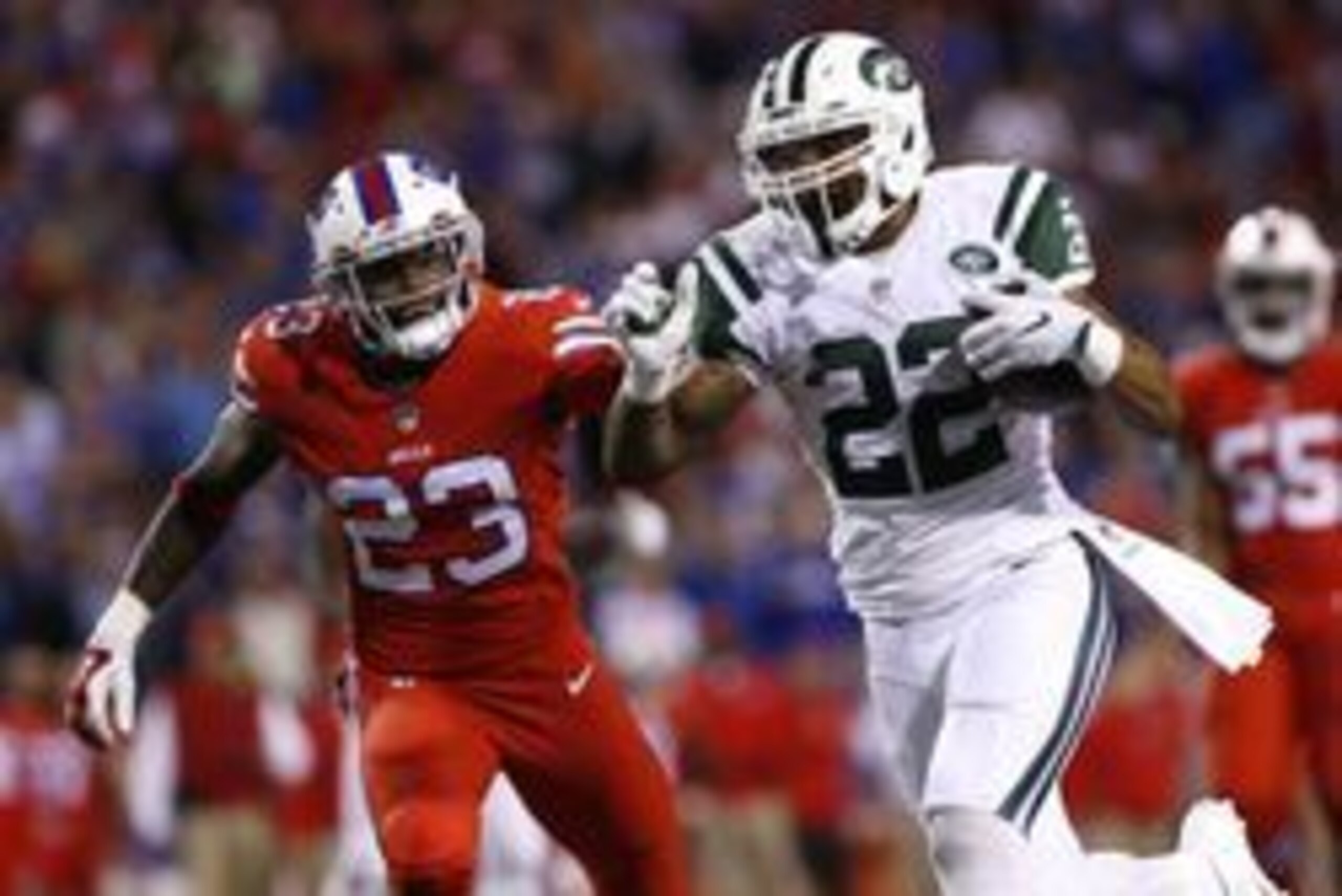 Sep 15, 2016; Orchard Park, NY, USA; New York Jets running back Matt Forte (22) runs for a touchdown as Buffalo Bills strong safety Aaron Williams (23) pursues during the second half at New Era Field. The Jets beat the Bills 37-31. Mandatory Credit: Kevin