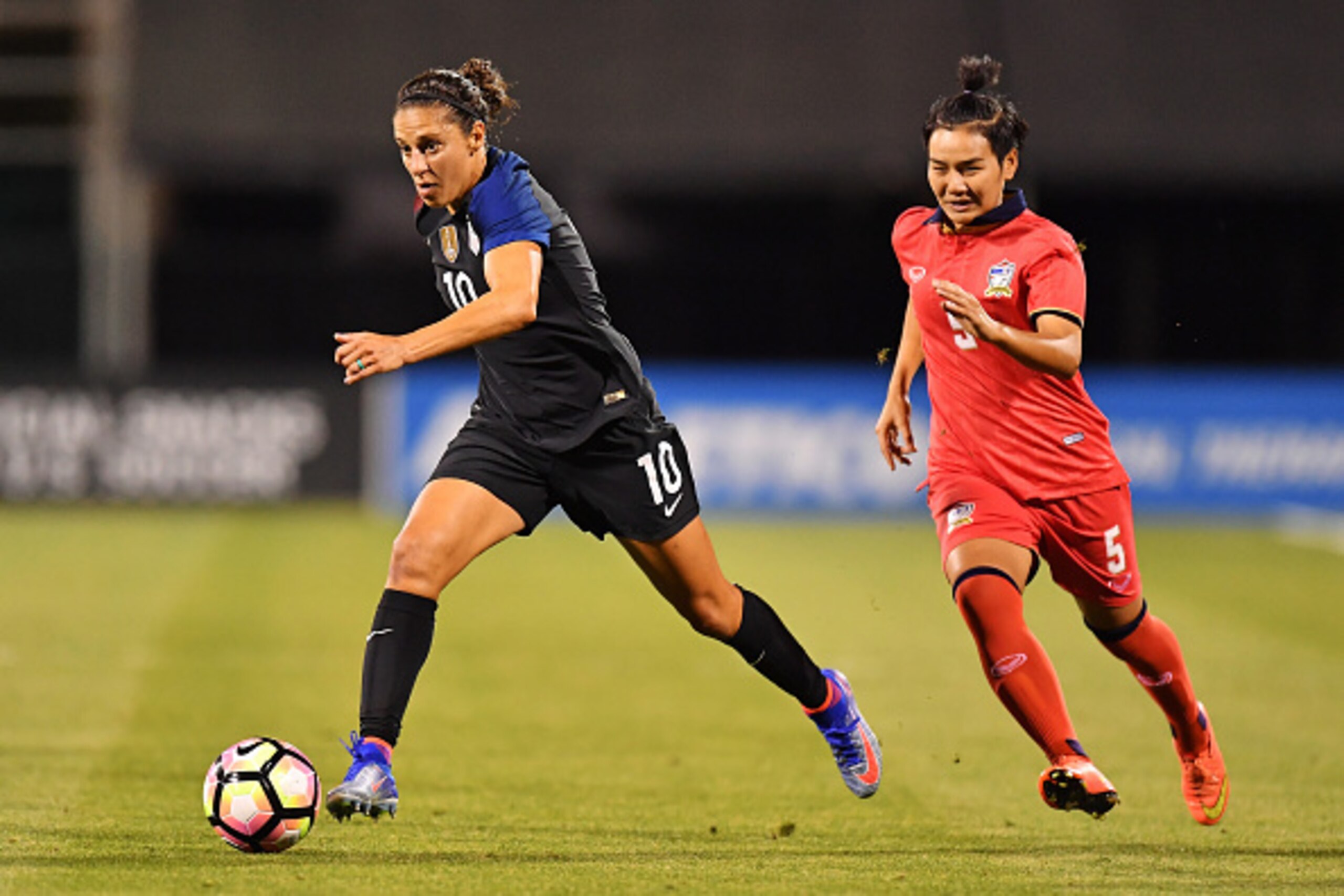 COLUMBUS, OH - SEPTEMBER 15:  Carli Lloyd #10 of the US Women's National Team moves the ball upfield in the second half as Ainon Phancha #5 of Thailand gives chase on September 15, 2016 at MAPFRE Stadium in Columbus, Ohio. The United States defeated Thail