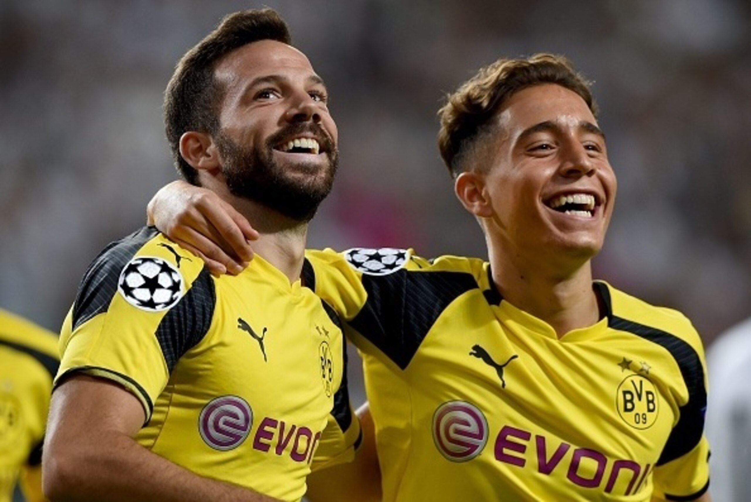 Dortmund's midfielder Gonzalo Castro (L) celebrates scoring with Dortmund's Turkish midfielder Emre Mor during the UEFA Champions League group F football match Legia Warsaw v Borussia Dortmund at the Legia stadium in Warsaw on September 14, 2016.   / AFP 