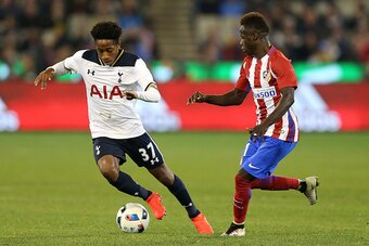 MELBOURNE, AUSTRALIA - JULY 29: Kyle Walker-Peters of Tottenham runs with the ball during 2016 International Champions Cup Australia match between Tottenham Hotspur and Atletico de Madrid at Melbourne Cricket Ground on July 29, 2016 in Melbourne, Australi