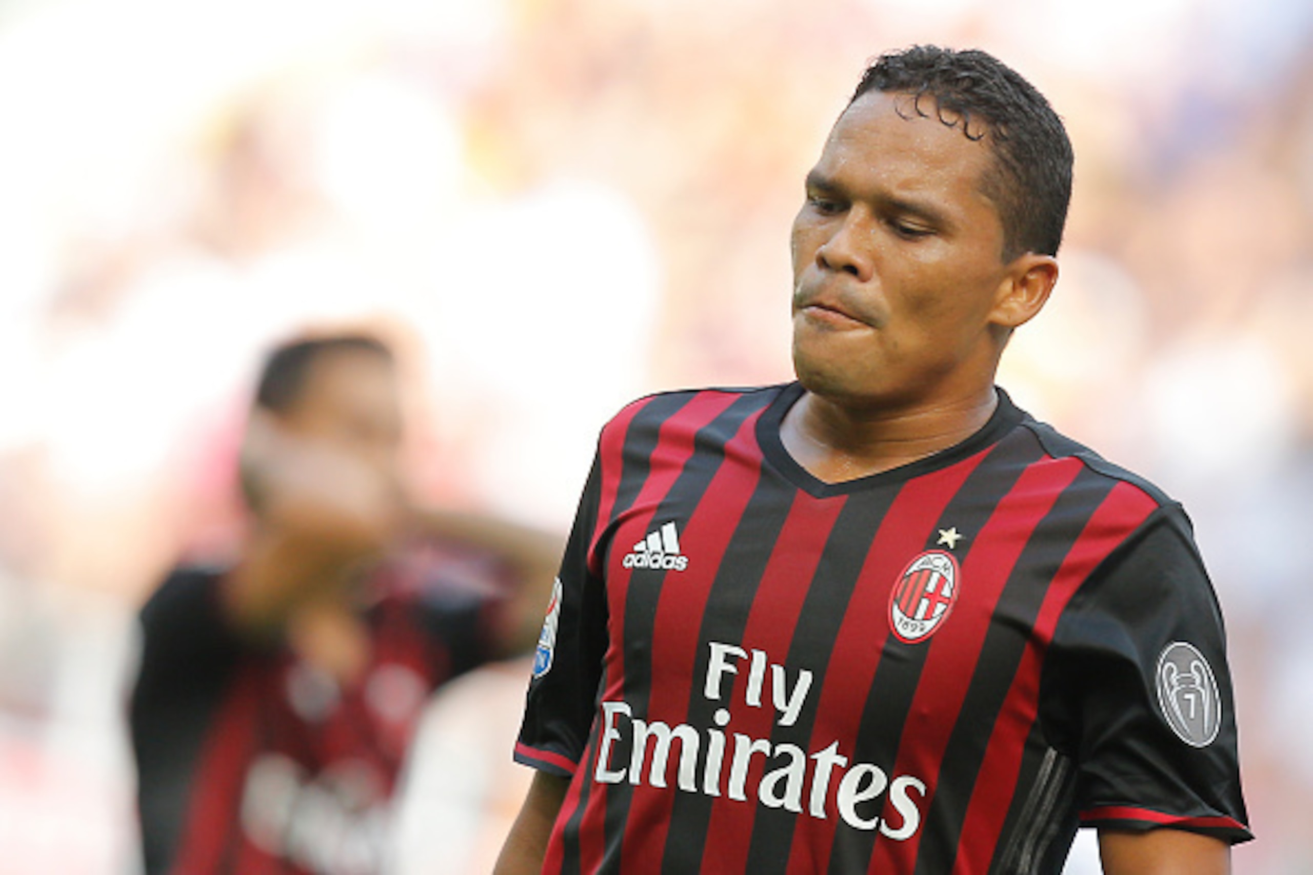 AC Milan's Colombian forward Carlos Bacca reacts during the Italian Serie A football match AC Milan Vs Udinese on September 11, 2016 at the San Siro stadium in Milan.  / AFP / MARCO BERTORELLO        (Photo credit should read MARCO BERTORELLO/AFP/Getty Im