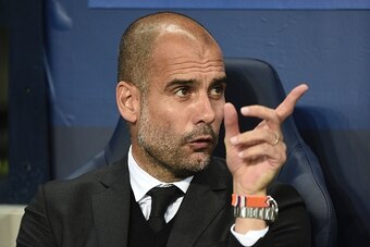 Manchester City's Spanish manager Pep Guardiola waits for kick off of the UEFA Champions League group C football match between Manchester City and Borussia Monchengladbach at the Etihad stadium in Manchester, northwest England, on September 14, 2016. / AF