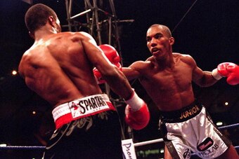 24 Jun 2000:  Junior Witter (right) jabs during his bout against Zab Juddah (left) at Hampden Park in Glasgow, Scotland.  Zab Juddah won on points. \ Mandatory Credit: John Gichigi /Allsport