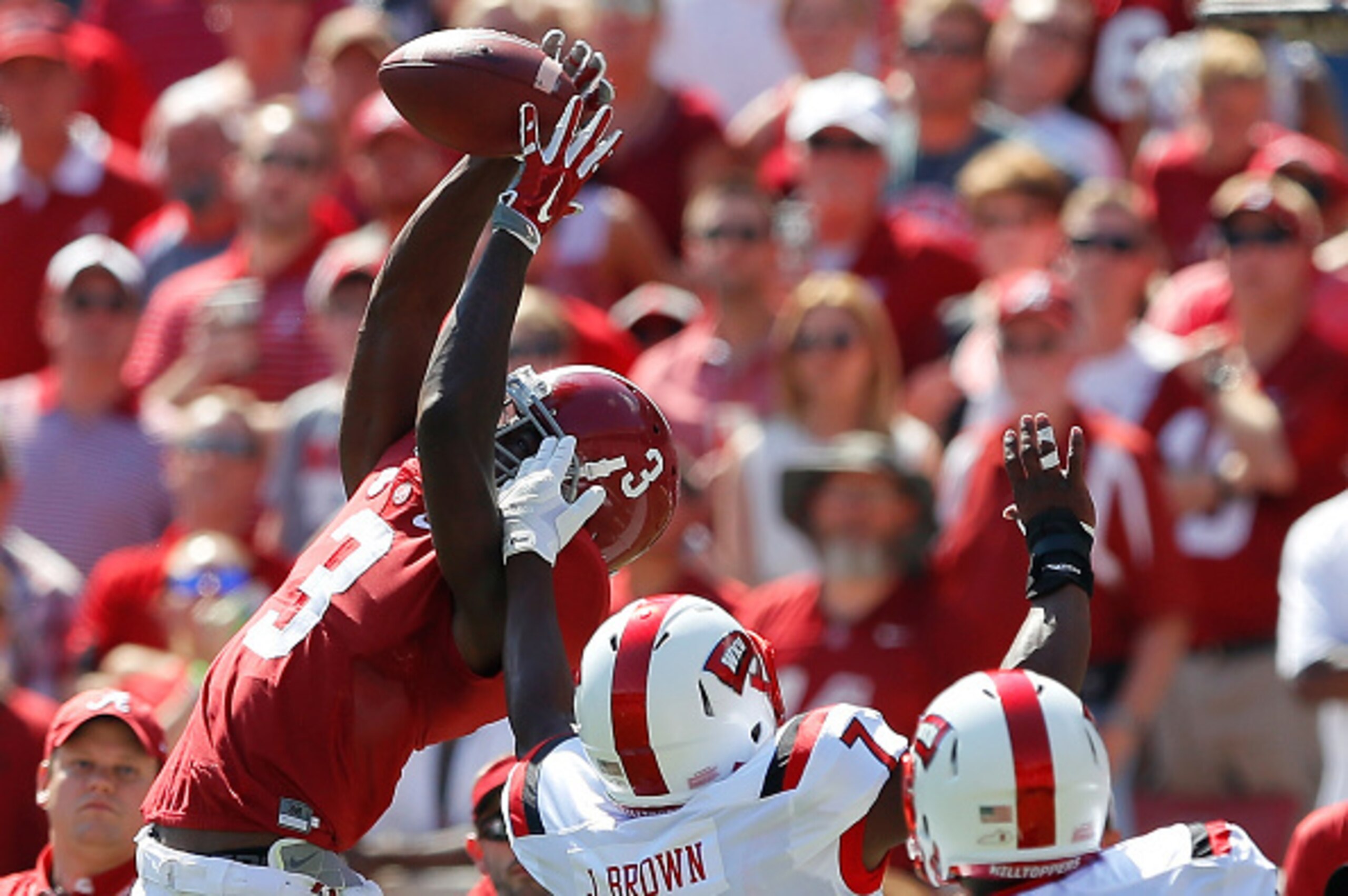 TUSCALOOSA, AL - SEPTEMBER 10:  Calvin Ridley #3 of the Alabama Crimson Tide pulls in this reception against Joe Brown #7 and Marcus Ward #8 of the Western Kentucky Hilltoppers at Bryant-Denny Stadium on September 10, 2016 in Tuscaloosa, Alabama.  (Photo 