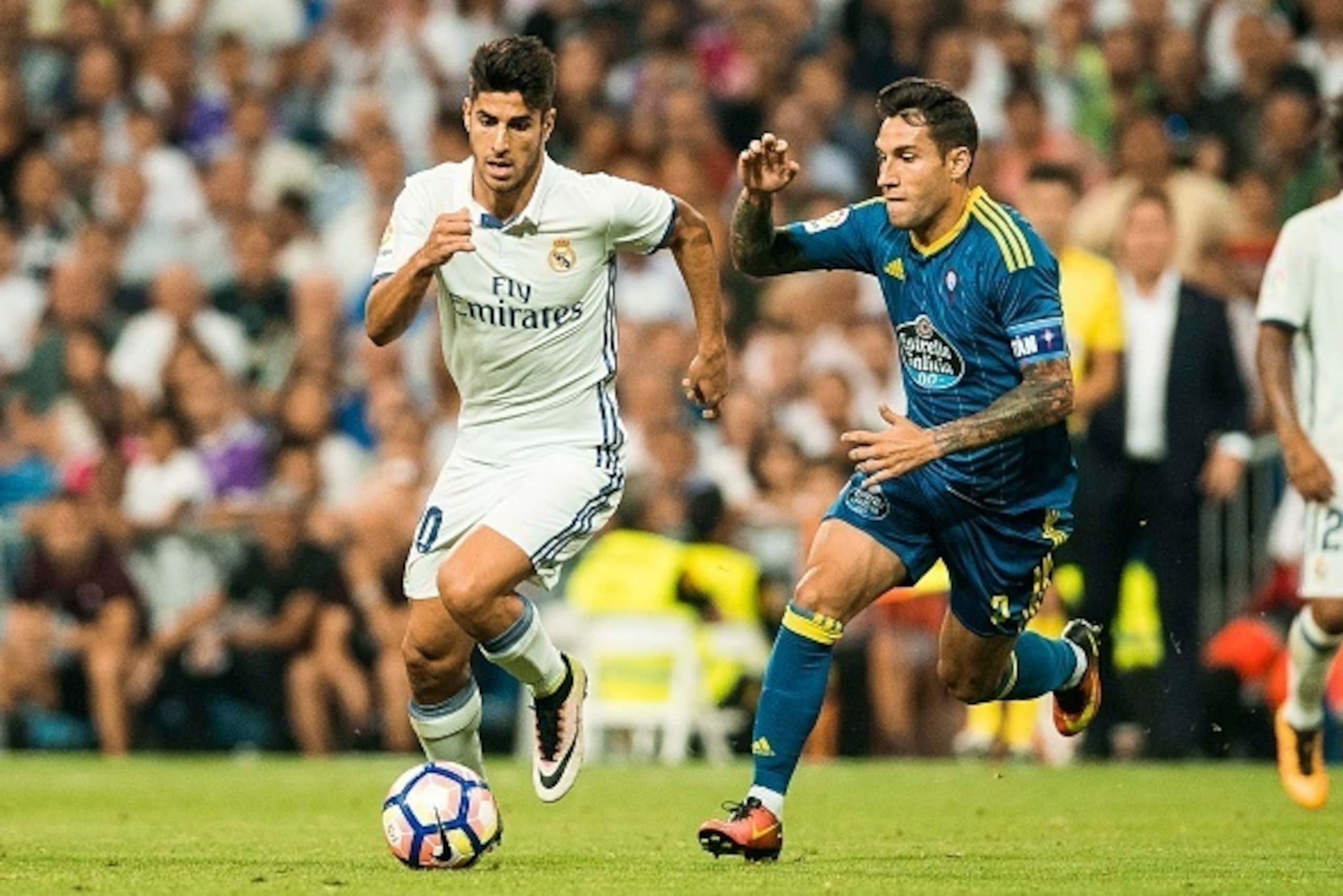 MADRID - AUGUST 27: Marco Asensio WIllemsen of Real Madrid in action during their La Liga match at the Santiago Bernabeu Stadium between Real Madrid and RC Celta de Vigo on 27 August 2016 in Madrid, Spain. (Photo by Power Sport Images/Getty Images)