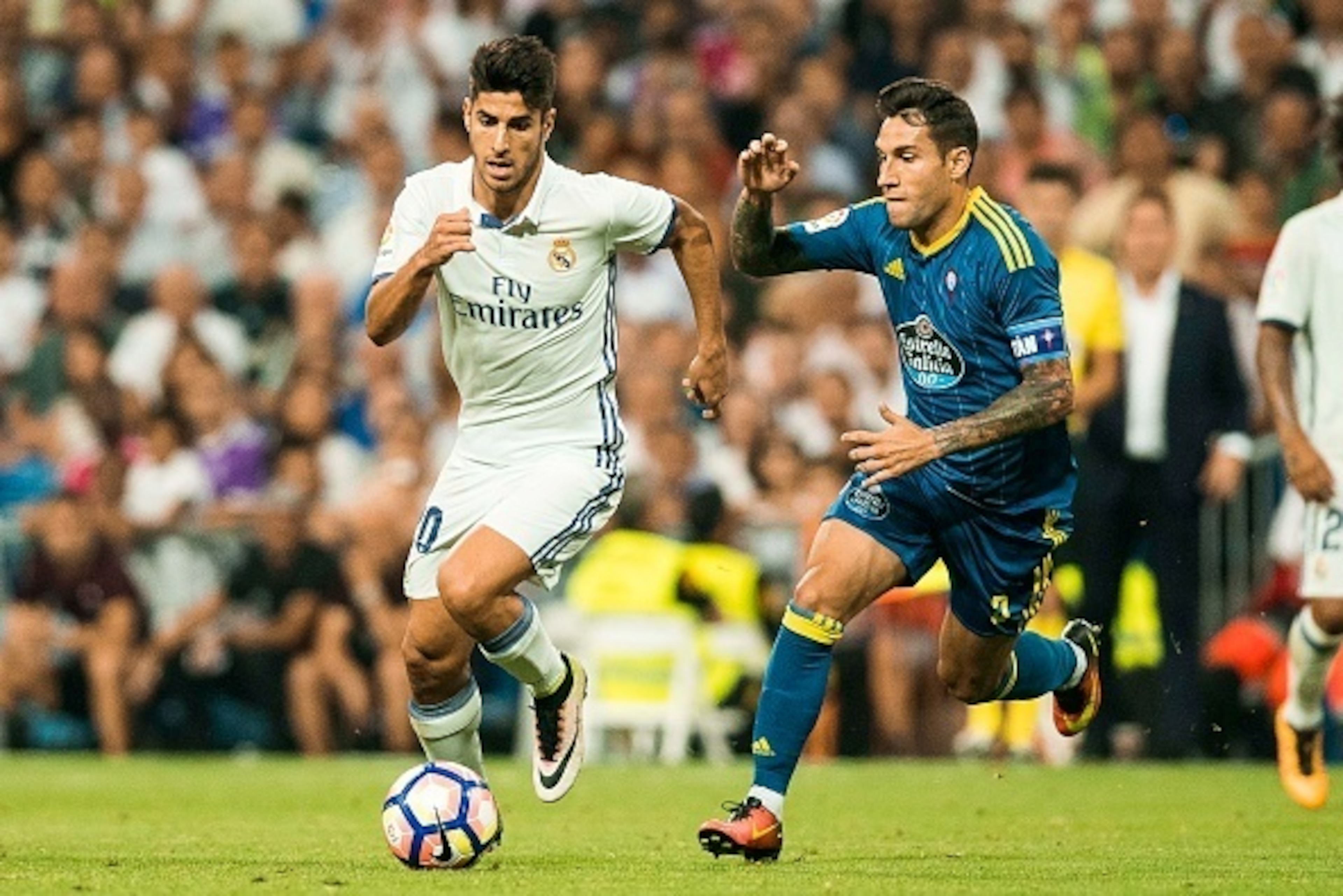 MADRID - AUGUST 27: Marco Asensio WIllemsen of Real Madrid in action during their La Liga match at the Santiago Bernabeu Stadium between Real Madrid and RC Celta de Vigo on 27 August 2016 in Madrid, Spain. (Photo by Power Sport Images/Getty Images)