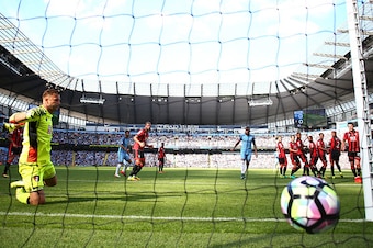 MANCHESTER, ENGLAND - SEPTEMBER 17: Kelechi Iheanacho of Manchester City scores his sides second goal during the Premier League match between Manchester City and AFC Bournemouth at the Etihad Stadium on September 17, 2016 in Manchester, England.  (Photo b