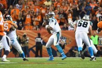 Sep 8, 2016; Denver, CO, USA; Carolina Panthers quarterback Cam Newton (1) prepares to pass the ball in the fourth quarter against the Denver Broncos at Sports Authority Field at Mile High. The Broncos defeated the Panthers 21-20. Mandatory Credit: Ron Ch
