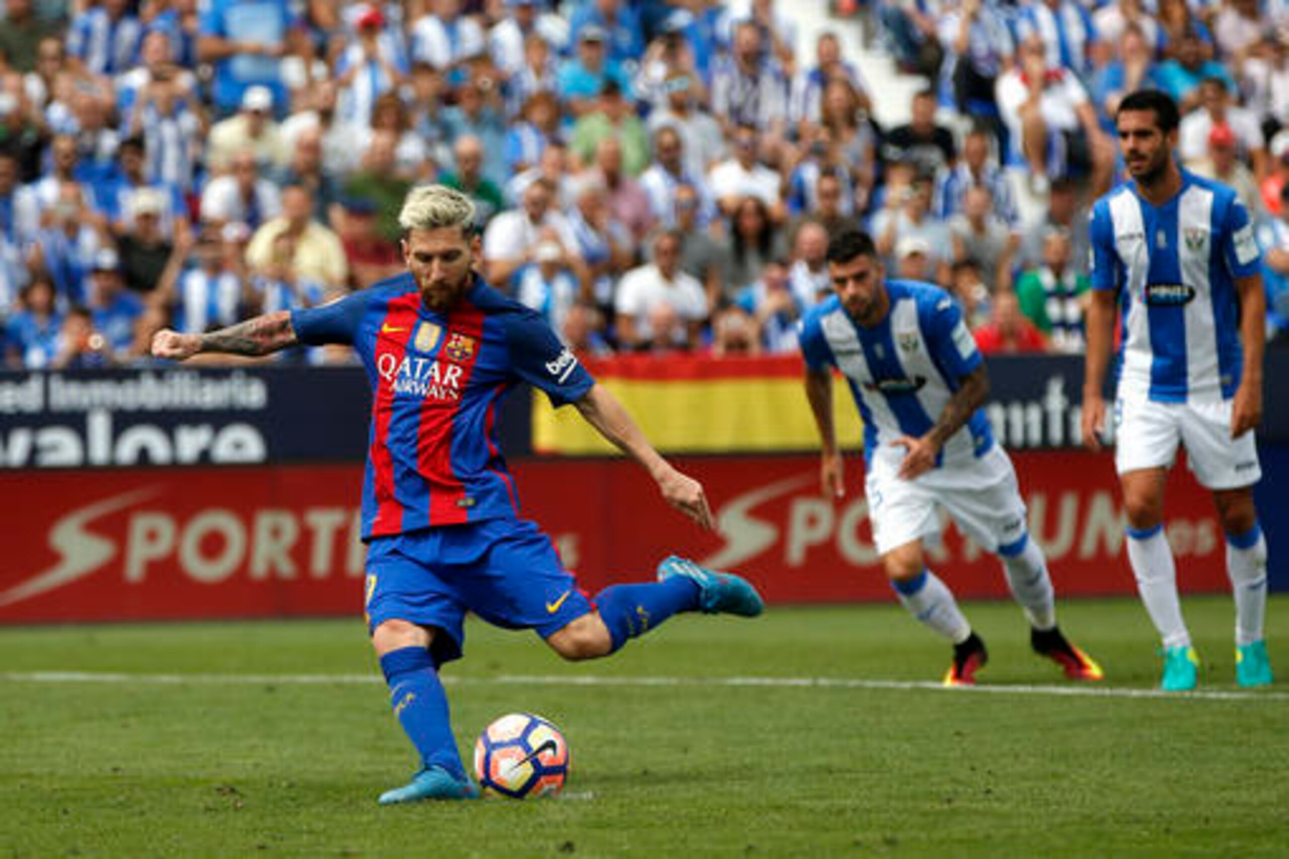 Lionel Messi fires home from the spot.