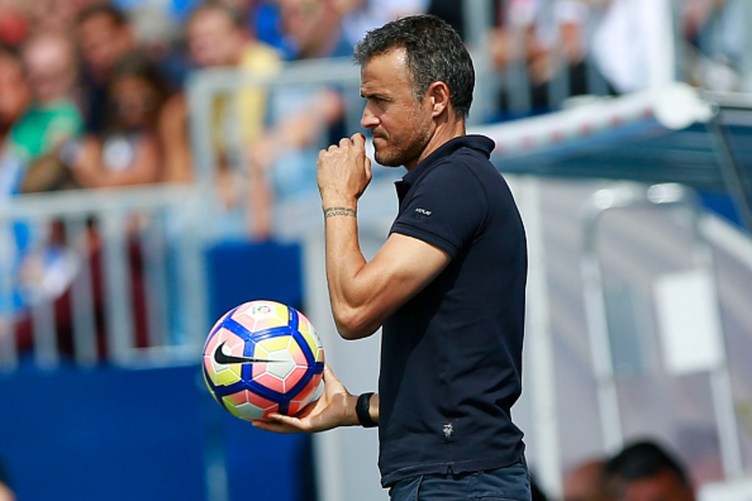 LEGANES, SPAIN - SEPTEMBER 17: Head coach Luis Enrique Martinez of FC Barcelona holds the ball during the La Liga match between Deportivo Leganes and FC Barcelona at Estadio Municipal de Butarque on September 17, 2016 in Leganes, Spain. (Photo by Gonzalo 