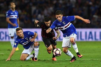GENOA, ITALY - SEPTEMBER 16:  Lucas Sebastian Torreira (R) of UC Sampdoria in action against Jose Sosa of AC Milan during the Serie A match between UC Sampdoria and AC Milan at Stadio Luigi Ferraris on September 16, 2016 in Genoa, Italy.  (Photo by Valeri