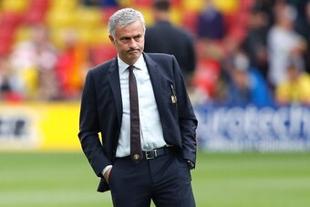 Manchester United's Portuguese manager Jose Mourinho looks on before the English Premier League football match between Watford and Manchester United at Vicarage Road Stadium in Watford, north of London on September 18, 2016. / AFP / Adrian DENNIS / RESTRI