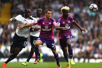 LONDON, ENGLAND - SEPTEMBER 18: Moussa Sissoko of Tottenham Hotspur (L) and Javier Manquillo of Sunderland (C)  during the Premier League match between Tottenham Hotspur and Sunderland at White Hart Lane on September 18, 2016 in London, England.  (Photo b