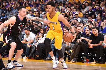 LOS ANGELES, CA - APRIL 6:  D'Angelo Russell #1 of the Los Angeles Lakers handles the ball against J.J. Redick #4 of the Los Angeles Clippers on April 6, 2016 at STAPLES Center in Los Angeles, California. NOTE TO USER: User expressly acknowledges and agre