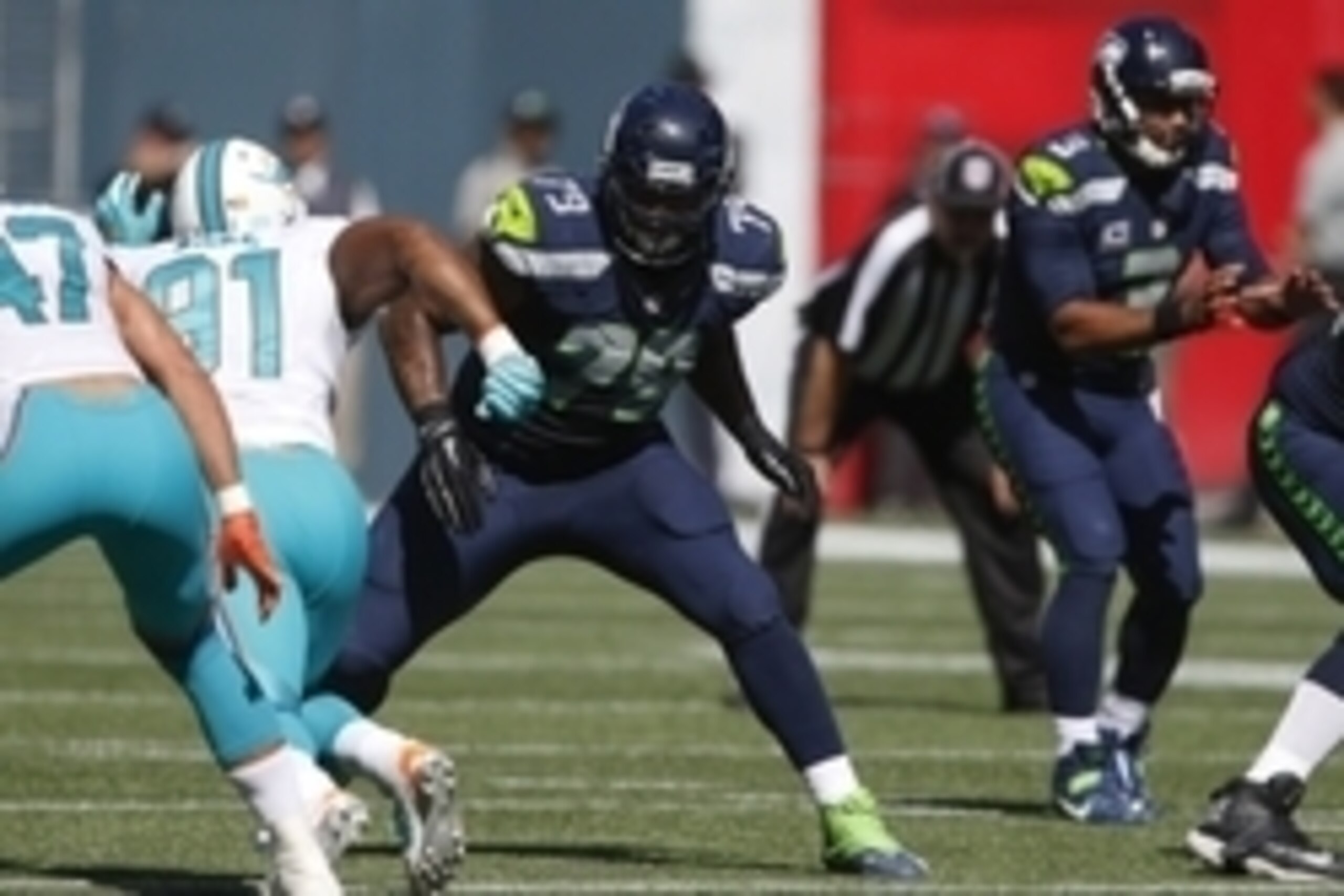 Sep 11, 2016; Seattle, WA, USA; Seattle Seahawks tackle Garry Gilliam (79) reacts to the snap against the Miami Dolphins during the second quarter at CenturyLink Field. Seattle defeated Miami 12-10. Mandatory Credit: Joe Nicholson-USA TODAY Sports