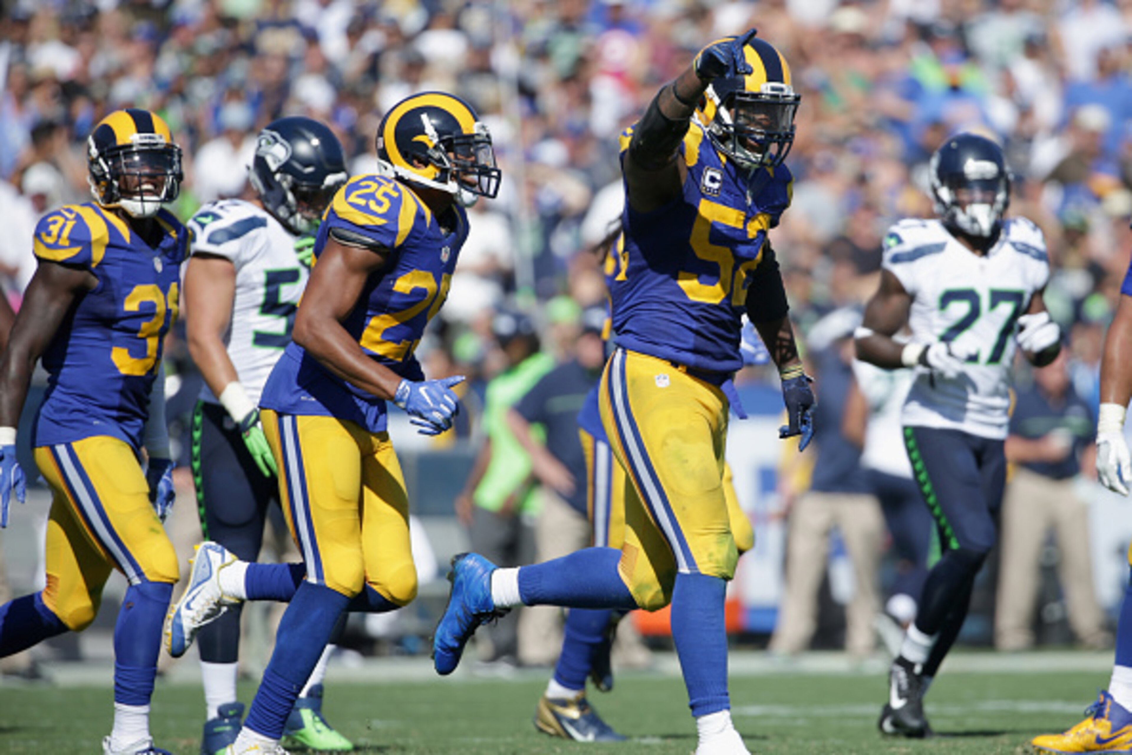 LOS ANGELES, CA - SEPTEMBER 18: Alec Ogletree #52 of the Los Angeles Rams celebrates during the fourth quarter of the home opening NFL game against the Seattle Seahawks at Los Angeles Coliseum on September 18, 2016 in Los Angeles, California. (Photo by LOS ANGELES, CA - SEPTEMBER 18: Alec Ogletree #52 of the Los Angeles Rams celebrates during the fourth quarter of the home opening NFL game against the Seattle Seahawks at Los Angeles Coliseum on September 18, 2016 in Los Angeles, California. (Photo by