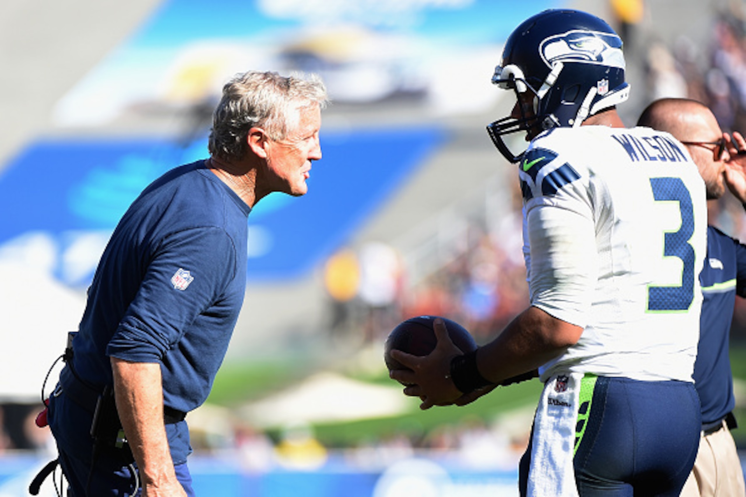 LOS ANGELES, CA - SEPTEMBER 18:  Head coach Pete Carroll of the Seattle Seahawks talks with quarterback  Russell Wilson #3 during the fourth quarter of the home opening NFL game against the Los Angeles Rams at Los Angeles Coliseum on September 18, 2016 in