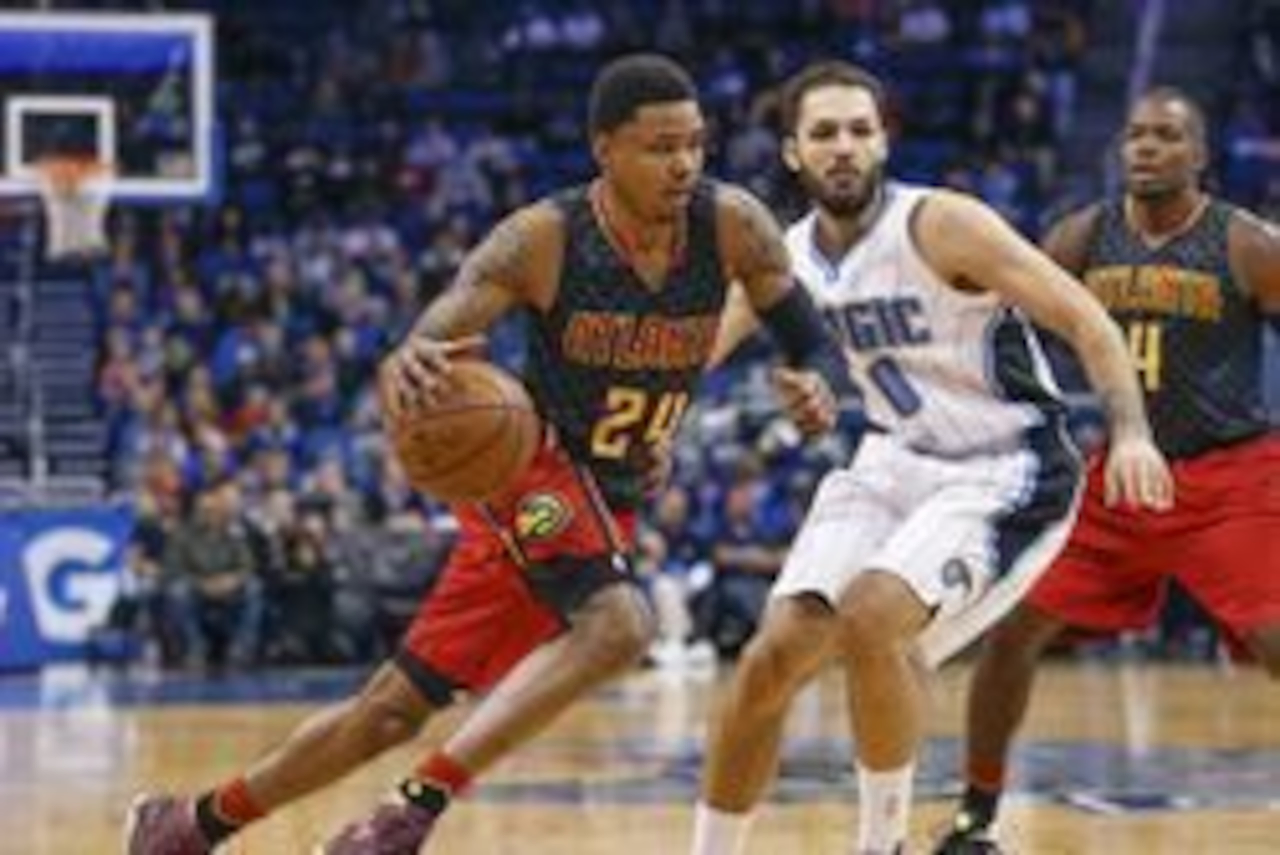 Feb 7, 2016; Orlando, FL, USA; Atlanta Hawks forward Kent Bazemore (24) drives around Orlando Magic guard Evan Fournier (10) during the first quarter during the first quarter of a basketball game at Amway Center. Mandatory Credit: Reinhold Matay-USA TODA Feb 7, 2016; Orlando, FL, USA; Atlanta Hawks forward Kent Bazemore (24) drives around Orlando Magic guard Evan Fournier (10) during the first quarter during the first quarter of a basketball game at Amway Center. Mandatory Credit: Reinhold Matay-USA TODA