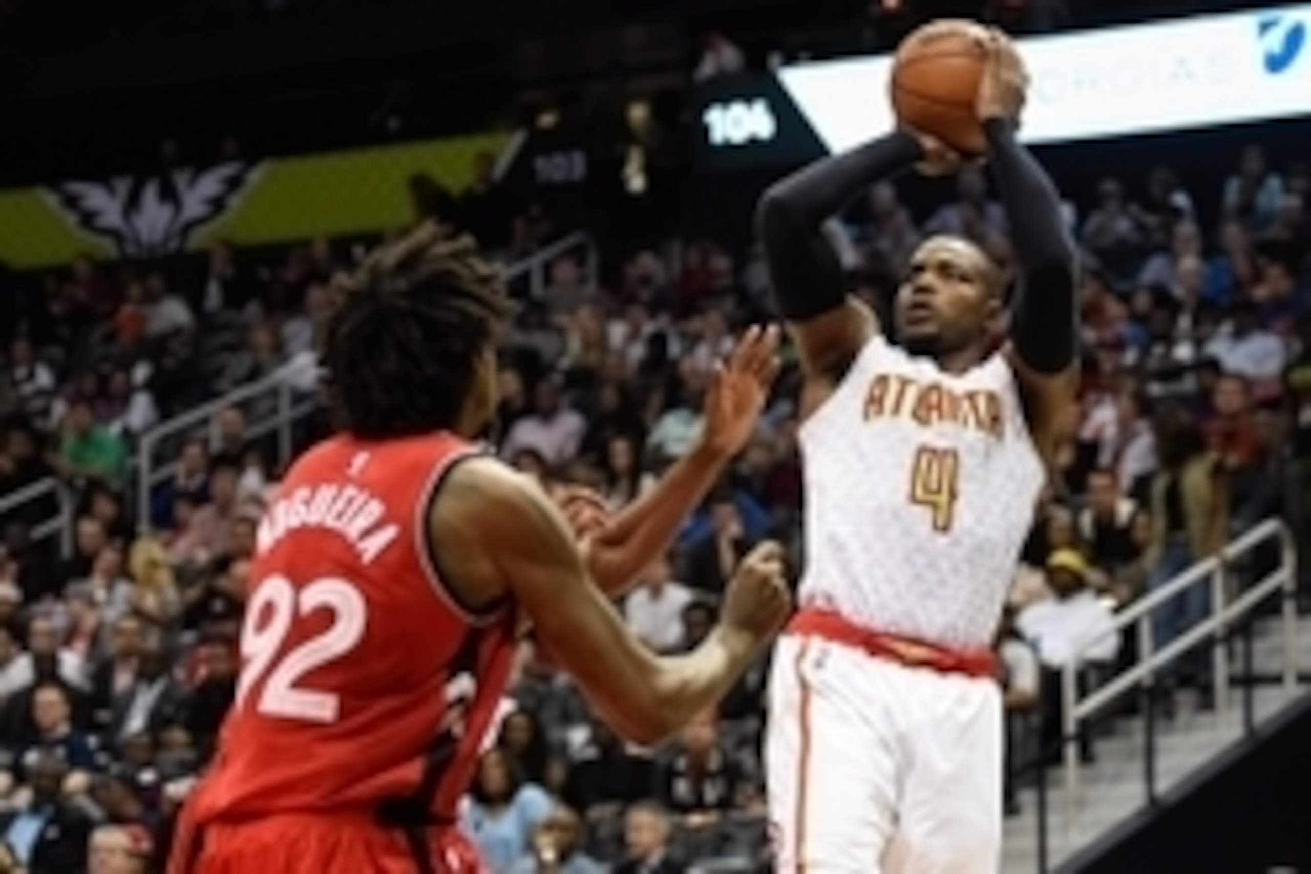 Apr 7, 2016; Atlanta, GA, USA; Atlanta Hawks forward Paul Millsap (4) shoots over Toronto Raptors center Lucas Nogueira (92) during the second half at Philips Arena. The Hawks defeated the Raptors 95-87. Mandatory Credit: Dale Zanine-USA TODAY Sports Apr 7, 2016; Atlanta, GA, USA; Atlanta Hawks forward Paul Millsap (4) shoots over Toronto Raptors center Lucas Nogueira (92) during the second half at Philips Arena. The Hawks defeated the Raptors 95-87. Mandatory Credit: Dale Zanine-USA TODAY Sports