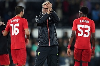 Liverpool's German manager Jurgen Klopp applauds the fans after the final whistle after the English League Cup third-round football match between Derby County and Liverpool at iPro Stadium in Derby, central England on September 20, 2016. Liverpool won the