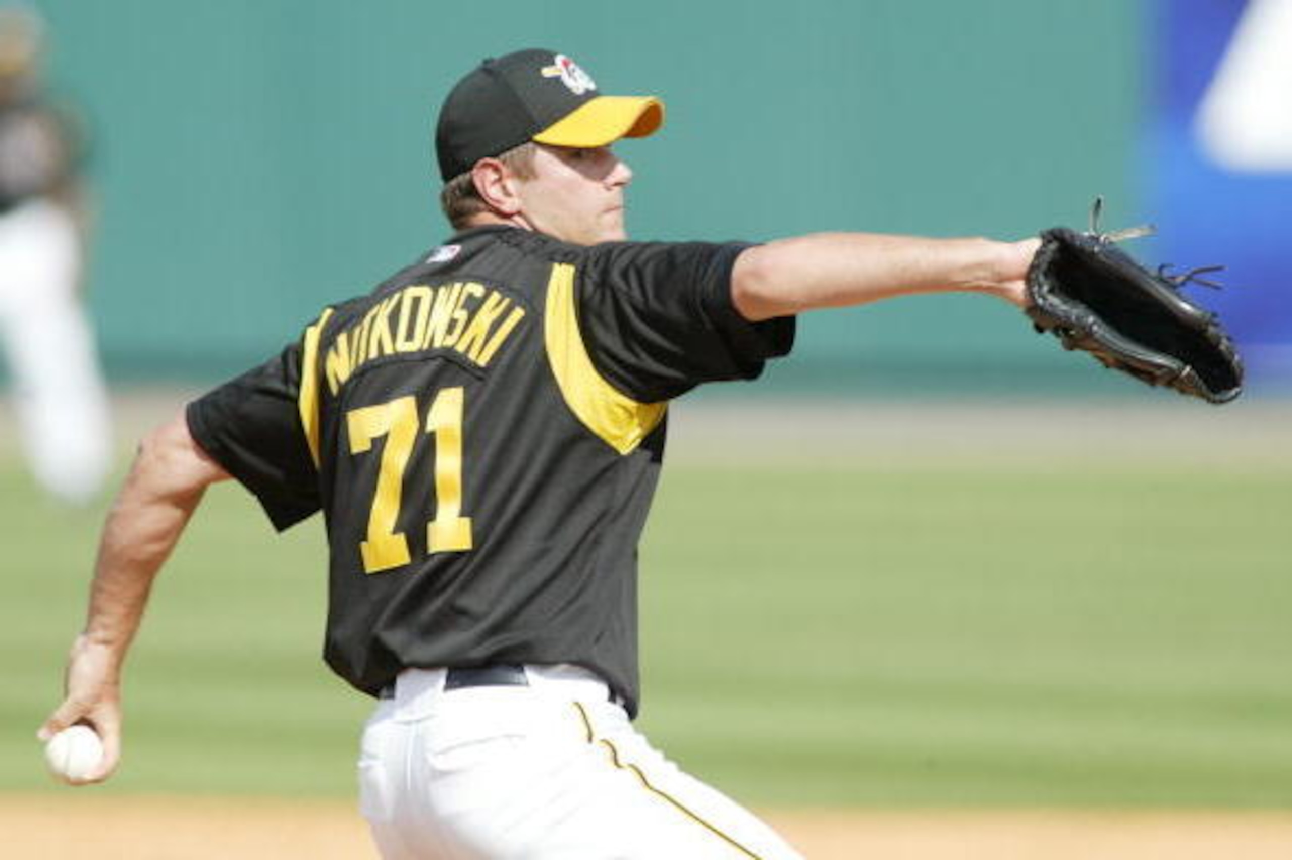 BRADENTON, FL. - MARCH 12, 2006:  C.J. Nitkowski #71 of the Pittsburgh Pirates pitches during the game against the Tampa Bay Devil Rays on March 12, 2006 at McKechnie Field in Bradenton, Florida. Devil Rays defeated the Pirates 7-4.  (Photo by Rick Stewar
