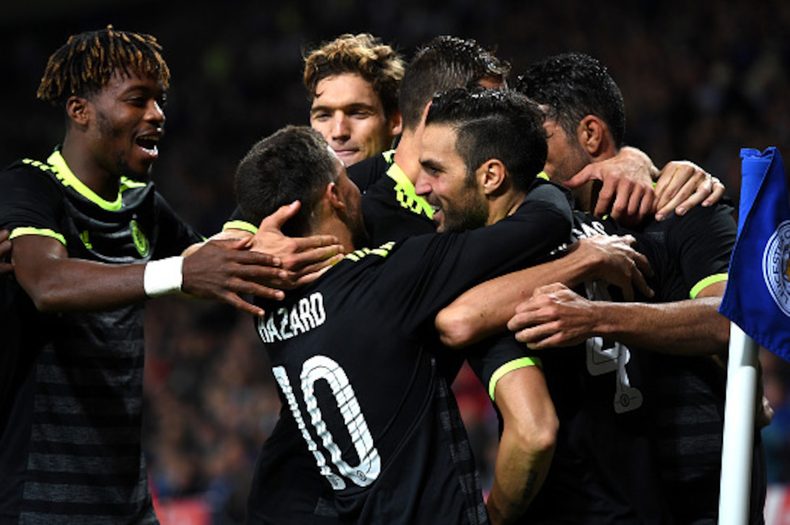 LEICESTER, ENGLAND - SEPTEMBER 20:  Cesc Fabregas of Chelsea celebrates with team mates after scoring his sides third goal during the EFL Cup Third Round match between Leicester City and Chelsea at The King Power Stadium on September 20, 2016 in Leicester