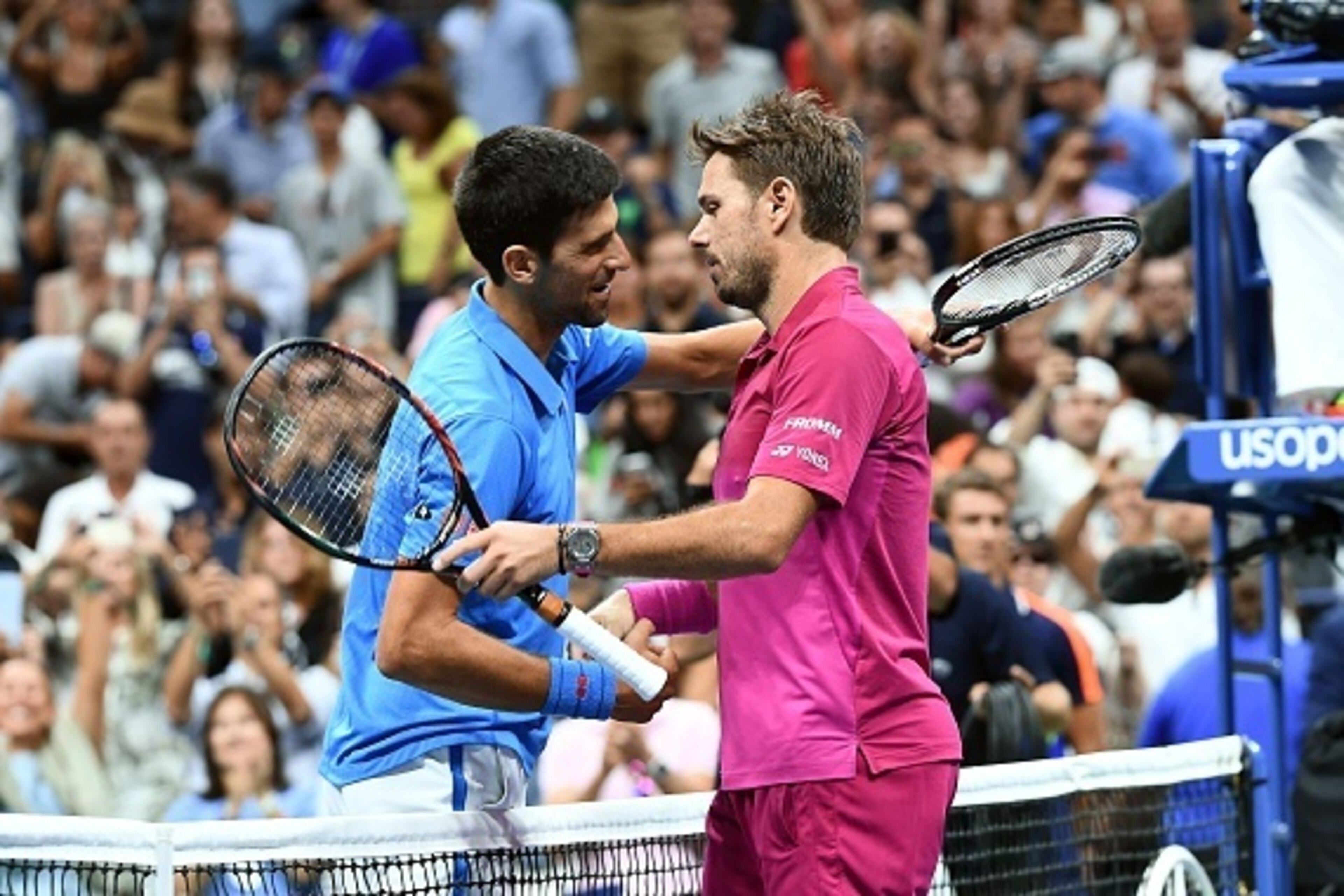 Stan Wawrinka of Switzerland embraces Novak Djokovic of Serbia during their 2016 US Open Men's Singles final match at the USTA Billie Jean King National Tennis Center in New York on September 11, 2016. / AFP / Jewel SAMAD (Photo credit should read Stan Wawrinka of Switzerland embraces Novak Djokovic of Serbia during their 2016 US Open Men's Singles final match at the USTA Billie Jean King National Tennis Center in New York on September 11, 2016. / AFP / Jewel SAMAD (Photo credit should read