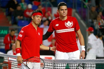 VANCOUVER, CANADA - MARCH 8:  Kei Nishikori of Japan and Milos Raonic of Canada (R) pose for a photo before their Davis Cup match March 8, 2015 in Vancouver, British Columbia, Canada. (Photo by Jeff Vinnick/Getty Images)