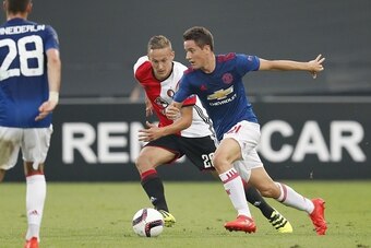 (L-R) Juan Mata of Manchester United, Jens Toornstra of Feyenoord, Ander Herrera of Manchester United during the Europa League group A match between Feyenoord and Manchester Uinited on September 15, 2016 at the Kuip stadium in Rotterdam, The Netherlands.(