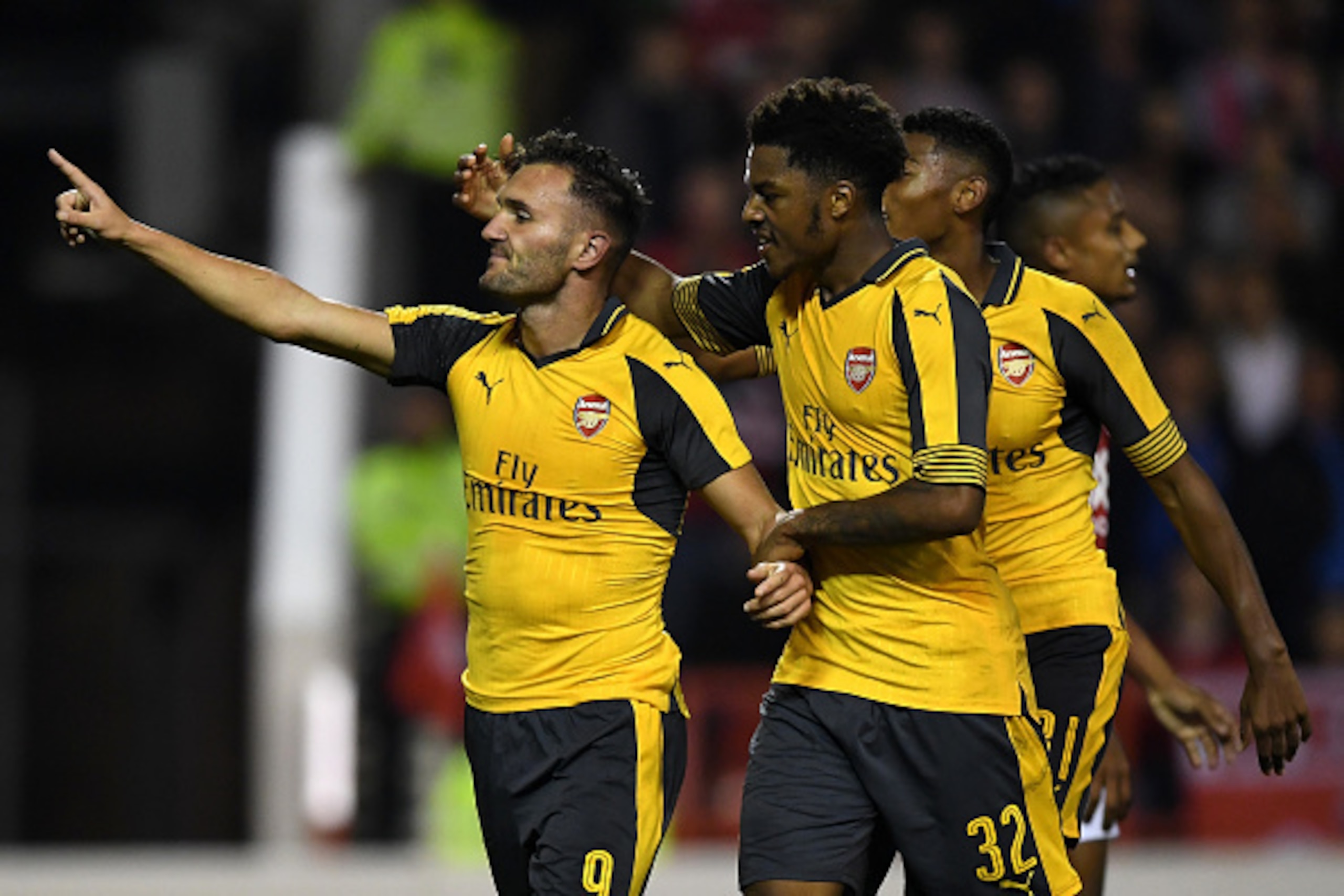 NOTTINGHAM, ENGLAND - SEPTEMBER 20:  Lucas Perez (L) of Arsenal celebrates scoring his team's third goal with Chuba Akpom of Arsenal during the EFL Cup Third Round match between Nottingham Forest and Arsenal at City Ground on September 20, 2016 in Notting