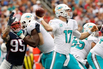 Sep 18, 2016; Foxborough, MA, USA; Miami Dolphins quarterback Ryan Tannehill (17) throws a pass against the New England Patriots in the second quarter at Gillette Stadium. Mandatory Credit: David Butler II-USA TODAY Sports