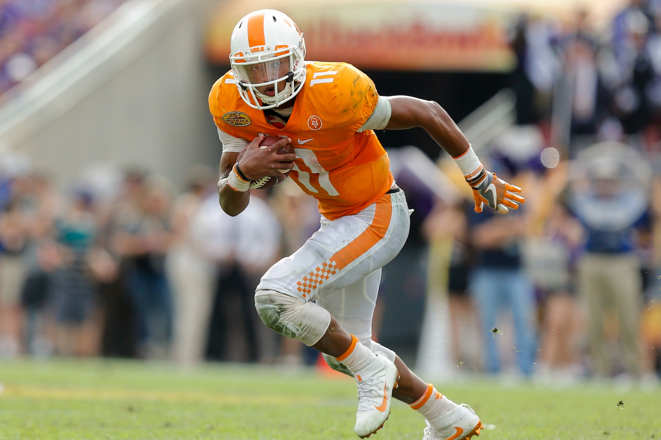 TAMPA, FL - JANUARY 1:  Joshua Dobbs #11 of the Tennessee Volunteers against the Northwestern Wildcats during the Outback Bowl at Raymond James Stadium on January 1, 2016 in Tampa, Florida. (Photo by Mike Carlson/Getty Images)