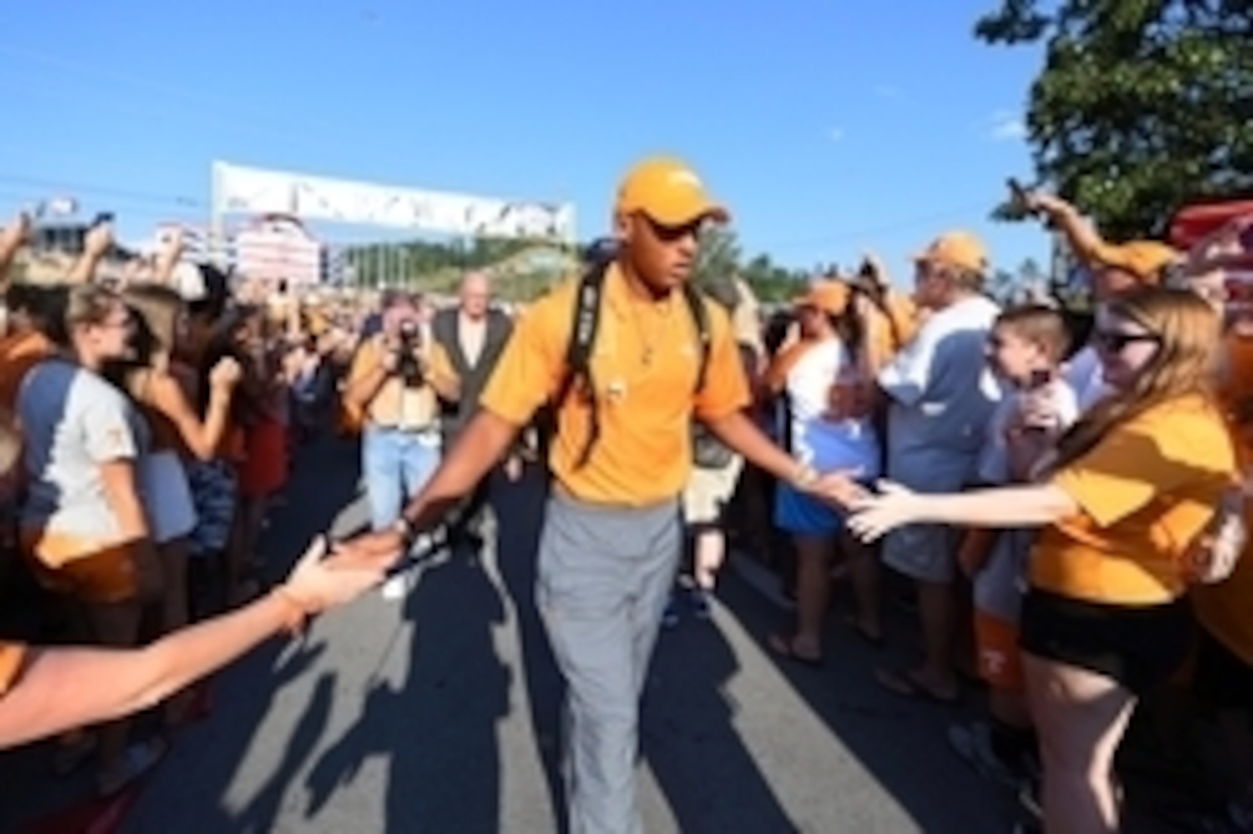 Sep 10, 2016; Bristol, TN, USA; Tennessee Volunteers quarterback Joshua Dobbs (11) walks through fans during Vol Walk prior to the Battle at Bristol agains the Virginia Tech Hokies at Bristol Motor Speedway. Mandatory Credit: Christopher Hanewinckel-USA T
