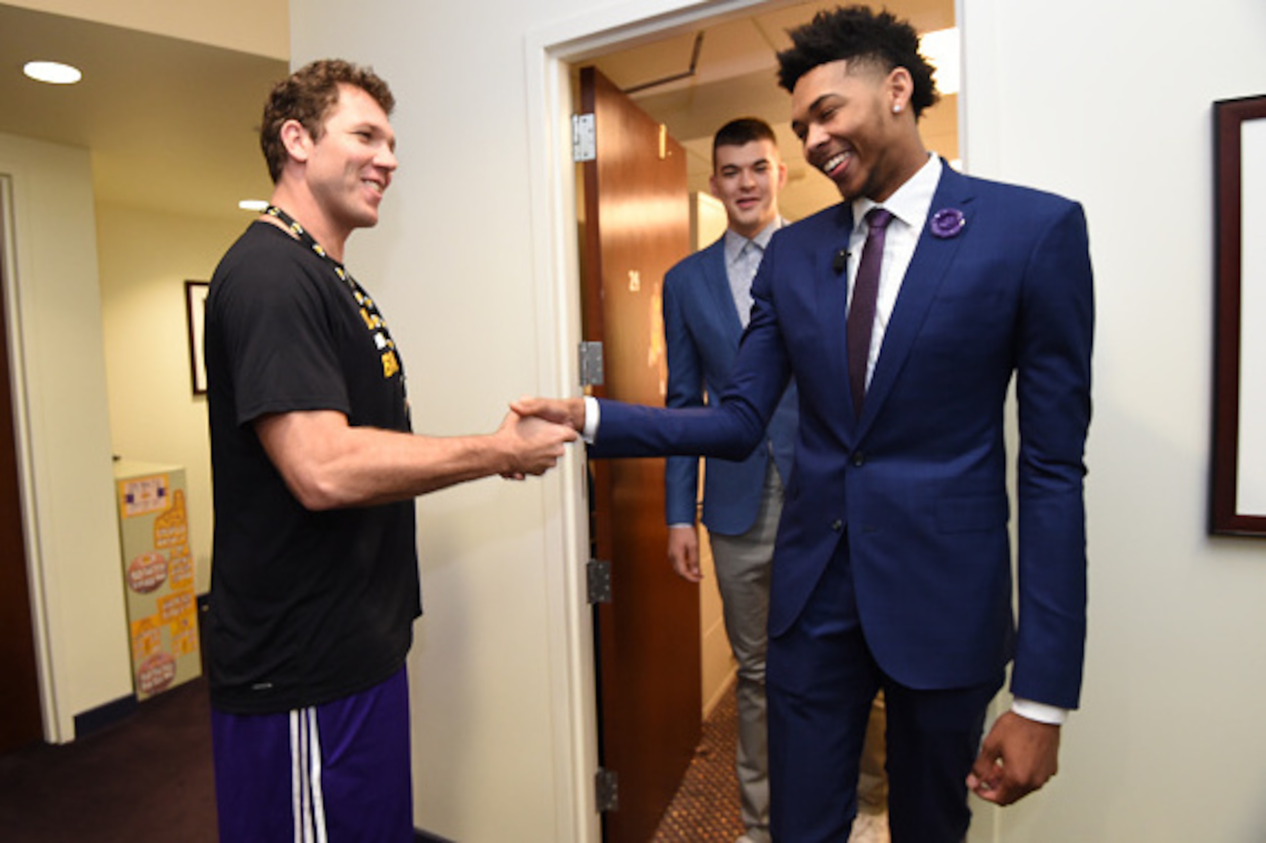 EL SEGUNDO, CA - JULY 5: Brandon Ingram #14 of the Los Angeles Lakers and Head Coach Luke Walton shake hands before a press conference to introduce Los Angeles Lakers draft picks Brandon Ingram and Ivica Zubac on July 5, 2016 at Toyota Sports Center in El