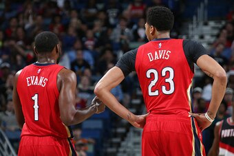 NEW ORLEANS, LA - DECEMBER 23: Tyreke Evans #1 and Anthony Davis #23 of the New Orleans Pelicans looks on during the game against the Portland Trail Blazers on December 23, 2015 at the Smoothie King Center in New Orleans, Louisiana. NOTE TO USER: User exp