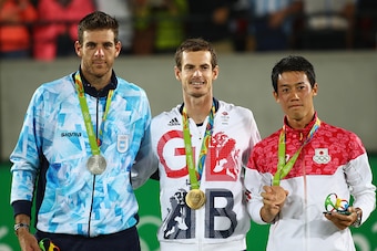 RIO DE JANEIRO, BRAZIL - AUGUST 14: (L-R) Silver medalist Juan Martin Del Potro of Argentina, gold medalist Andy Murray of Great Britain and bronze medalist Kei Nishikori of Japan pose on the podium during the medal ceremony for the men's singles on Day 9
