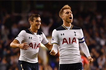 LONDON, ENGLAND - SEPTEMBER 21:  Christian Eriksen of Tottenham Hotspur celebrates scoring his sides first goal with Harry Winks of Tottenham Hotspur during the  EFL Cup Third Round match between Tottenham Hotspur and Gillingham at White Hart Lane on Sept