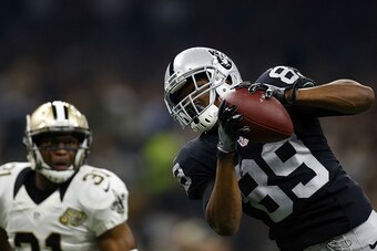 NEW ORLEANS, LA - SEPTEMBER 11: Amari Cooper #89 of the Oakland Raiders catches a ball as Jairus Byrd #31 of the New Orleans Saints defends  during the first half of a game at Mercedes-Benz Superdome on September 11, 2016 in New Orleans, Louisiana.  (Phot